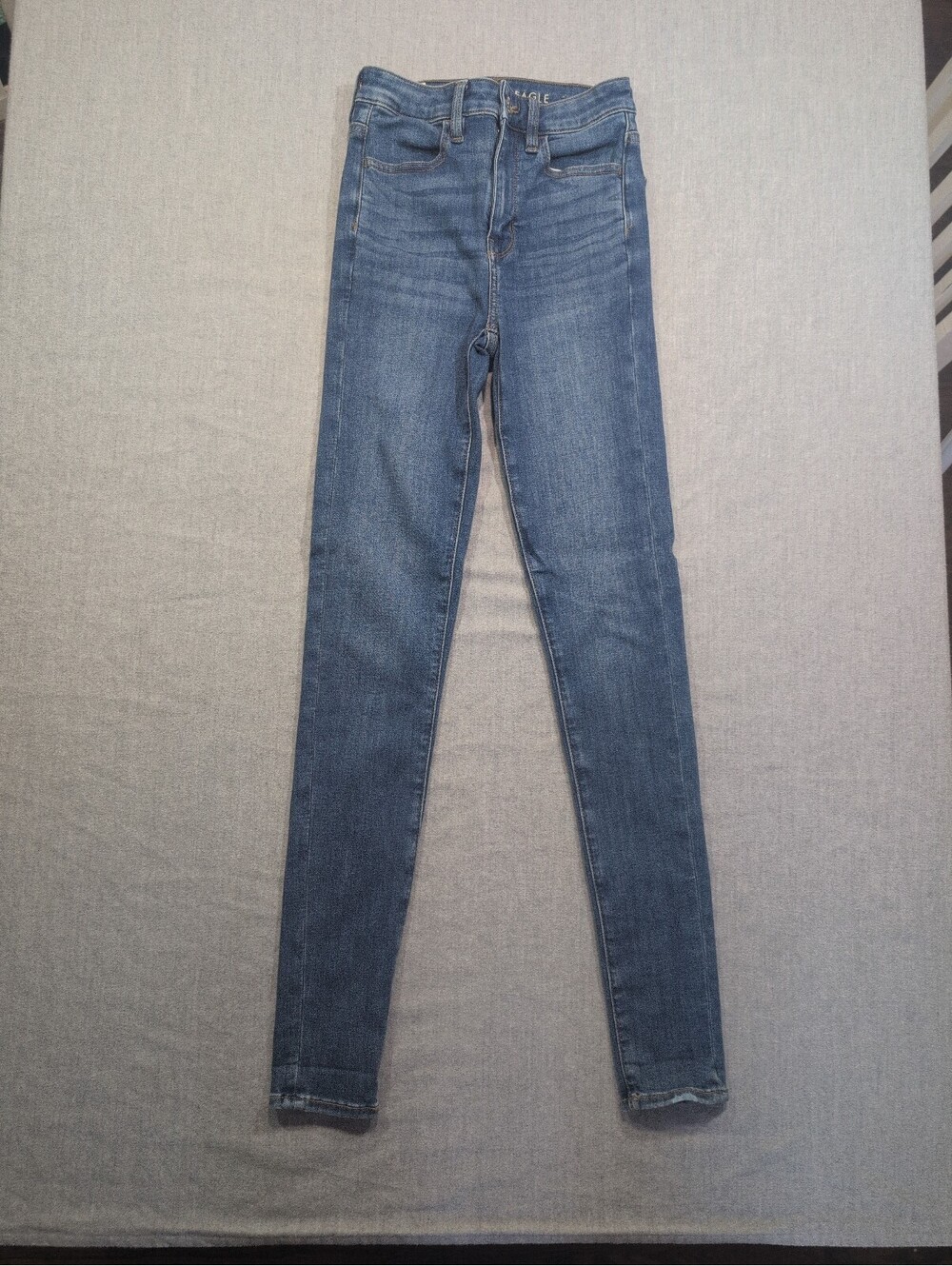 American Eagle Super Hi-Rise Jegging blue jeans next level stretch size 00 long